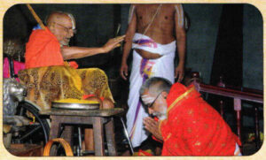 {"type":"elementor","siteurl":"https://sarmasastrigal.in/wp-json/","elements":[{"id":"f423276","elType":"widget","isInner":false,"isLocked":false,"settings":{"editor":"<p>Initially hesitant to approach the Jeer of Ahobila Math due to his Smartha background, Sarma Sastrigal was pleasantly surprised when the pontiff warmly received him. The meeting, facilitated by his friend Sundar, led to the release of his travelogue on Gaya. The recognition he received from the Math was an unexpected blessing, and over time, he was embraced with affection. On a later occasion, during the Jeer’s Jayanti celebrations in Srirangam, he was honored alongside Vaishnavas, a rare distinction that deeply moved him.</p>","drop_cap":"","text_columns":"","text_columns_tablet":"","text_columns_mobile":"","column_gap":{"unit":"px","size":"","sizes":[]},"column_gap_tablet":{"unit":"px","size":"","sizes":[]},"column_gap_mobile":{"unit":"px","size":"","sizes":[]},"align":"","align_tablet":"","align_mobile":"","typography_typography":"","typography_font_family":"","typography_font_size":{"unit":"px","size":"","sizes":[]},"typography_font_size_tablet":{"unit":"px","size":"","sizes":[]},"typography_font_size_mobile":{"unit":"px","size":"","sizes":[]},"typography_font_weight":"","typography_text_transform":"","typography_font_style":"","typography_text_decoration":"","typography_line_height":{"unit":"px","size":"","sizes":[]},"typography_line_height_tablet":{"unit":"em","size":"","sizes":[]},"typography_line_height_mobile":{"unit":"em","size":"","sizes":[]},"typography_letter_spacing":{"unit":"px","size":"","sizes":[]},"typography_letter_spacing_tablet":{"unit":"px","size":"","sizes":[]},"typography_letter_spacing_mobile":{"unit":"px","size":"","sizes":[]},"typography_word_spacing":{"unit":"px","size":"","sizes":[]},"typography_word_spacing_tablet":{"unit":"em","size":"","sizes":[]},"typography_word_spacing_mobile":{"unit":"em","size":"","sizes":[]},"text_shadow_text_shadow_type":"","text_shadow_text_shadow":{"horizontal":0,"vertical":0,"blur":10,"color":"rgba(0,0,0,0.3)"},"paragraph_spacing":{"unit":"px","size":"","sizes":[]},"paragraph_spacing_tablet":{"unit":"px","size":"","sizes":[]},"paragraph_spacing_mobile":{"unit":"px","size":"","sizes":[]},"text_color":"","link_color":"","link_hover_color":"","link_hover_color_transition_duration":{"unit":"s","size":"","sizes":[]},"drop_cap_view":"default","drop_cap_primary_color":"","drop_cap_secondary_color":"","drop_cap_shadow_text_shadow_type":"","drop_cap_shadow_text_shadow":{"horizontal":0,"vertical":0,"blur":10,"color":"rgba(0,0,0,0.3)"},"drop_cap_size":{"unit":"px","size":5,"sizes":[]},"drop_cap_space":{"unit":"px","size":10,"sizes":[]},"drop_cap_border_radius":{"unit":"%","size":"","sizes":[]},"drop_cap_border_width":{"unit":"px","top":"","right":"","bottom":"","left":"","isLinked":true},"drop_cap_typography_typography":"","drop_cap_typography_font_family":"","drop_cap_typography_font_size":{"unit":"px","size":"","sizes":[]},"drop_cap_typography_font_size_tablet":{"unit":"px","size":"","sizes":[]},"drop_cap_typography_font_size_mobile":{"unit":"px","size":"","sizes":[]},"drop_cap_typography_font_weight":"","drop_cap_typography_text_transform":"","drop_cap_typography_font_style":"","drop_cap_typography_text_decoration":"","drop_cap_typography_line_height":{"unit":"px","size":"","sizes":[]},"drop_cap_typography_line_height_tablet":{"unit":"em","size":"","sizes":[]},"drop_cap_typography_line_height_mobile":{"unit":"em","size":"","sizes":[]},"drop_cap_typography_word_spacing":{"unit":"px","size":"","sizes":[]},"drop_cap_typography_word_spacing_tablet":{"unit":"em","size":"","sizes":[]},"drop_cap_typography_word_spacing_mobile":{"unit":"em","size":"","sizes":[]},"_title":"","_margin":{"unit":"px","top":"","right":"","bottom":"","left":"","isLinked":true},"_margin_tablet":{"unit":"px","top":"","right":"","bottom":"","left":"","isLinked":true},"_margin_mobile":{"unit":"px","top":"","right":"","bottom":"","left":"","isLinked":true},"_padding":{"unit":"px","top":"","right":"","bottom":"","left":"","isLinked":true},"_padding_tablet":{"unit":"px","top":"","right":"","bottom":"","left":"","isLinked":true},"_padding_mobile":{"unit":"px","top":"","right":"","bottom":"","left":"","isLinked":true},"_element_width":"","_element_width_tablet":"","_element_width_mobile":"","_element_custom_width":{"unit":"%","size":"","sizes":[]},"_element_custom_width_tablet":{"unit":"px","size":"","sizes":[]},"_element_custom_width_mobile":{"unit":"px","size":"","sizes":[]},"_grid_column":"","_grid_column_tablet":"","_grid_column_mobile":"","_grid_column_custom":"","_grid_column_custom_tablet":"","_grid_column_custom_mobile":"","_grid_row":"","_grid_row_tablet":"","_grid_row_mobile":"","_grid_row_custom":"","_grid_row_custom_tablet":"","_grid_row_custom_mobile":"","_flex_align_self":"","_flex_align_self_tablet":"","_flex_align_self_mobile":"","_flex_order":"","_flex_order_tablet":"","_flex_order_mobile":"","_flex_order_custom":"","_flex_order_custom_tablet":"","_flex_order_custom_mobile":"","_flex_size":"","_flex_size_tablet":"","_flex_size_mobile":"","_flex_grow":1,"_flex_grow_tablet":"","_flex_grow_mobile":"","_flex_shrink":1,"_flex_shrink_tablet":"","_flex_shrink_mobile":"","_element_vertical_align":"","_element_vertical_align_tablet":"","_element_vertical_align_mobile":"","_position":"","_offset_orientation_h":"start","_offset_x":{"unit":"px","size":0,"sizes":[]},"_offset_x_tablet":{"unit":"px","size":"","sizes":[]},"_offset_x_mobile":{"unit":"px","size":"","sizes":[]},"_offset_x_end":{"unit":"px","size":0,"sizes":[]},"_offset_x_end_tablet":{"unit":"px","size":"","sizes":[]},"_offset_x_end_mobile":{"unit":"px","size":"","sizes":[]},"_offset_orientation_v":"start","_offset_y":{"unit":"px","size":0,"sizes":[]},"_offset_y_tablet":{"unit":"px","size":"","sizes":[]},"_offset_y_mobile":{"unit":"px","size":"","sizes":[]},"_offset_y_end":{"unit":"px","size":0,"sizes":[]},"_offset_y_end_tablet":{"unit":"px","size":"","sizes":[]},"_offset_y_end_mobile":{"unit":"px","size":"","sizes":[]},"_z_index":"","_z_index_tablet":"","_z_index_mobile":"","_element_id":"","_css_classes":"","e_display_conditions":"","_element_cache":"","motion_fx_motion_fx_scrolling":"","motion_fx_translateY_effect":"","motion_fx_translateY_direction":"","motion_fx_translateY_speed":{"unit":"px","size":4,"sizes":[]},"motion_fx_translateY_affectedRange":{"unit":"%","size":"","sizes":{"start":0,"end":100}},"motion_fx_translateX_effect":"","motion_fx_translateX_direction":"","motion_fx_translateX_speed":{"unit":"px","size":4,"sizes":[]},"motion_fx_translateX_affectedRange":{"unit":"%","size":"","sizes":{"start":0,"end":100}},"motion_fx_opacity_effect":"","motion_fx_opacity_direction":"out-in","motion_fx_opacity_level":{"unit":"px","size":10,"sizes":[]},"motion_fx_opacity_range":{"unit":"%","size":"","sizes":{"start":20,"end":80}},"motion_fx_blur_effect":"","motion_fx_blur_direction":"out-in","motion_fx_blur_level":{"unit":"px","size":7,"sizes":[]},"motion_fx_blur_range":{"unit":"%","size":"","sizes":{"start":20,"end":80}},"motion_fx_rotateZ_effect":"","motion_fx_rotateZ_direction":"","motion_fx_rotateZ_speed":{"unit":"px","size":1,"sizes":[]},"motion_fx_rotateZ_affectedRange":{"unit":"%","size":"","sizes":{"start":0,"end":100}},"motion_fx_scale_effect":"","motion_fx_scale_direction":"out-in","motion_fx_scale_speed":{"unit":"px","size":4,"sizes":[]},"motion_fx_scale_range":{"unit":"%","size":"","sizes":{"start":20,"end":80}},"motion_fx_transform_origin_x":"center","motion_fx_transform_origin_y":"center","motion_fx_devices":["desktop","tablet","mobile"],"motion_fx_range":"","motion_fx_motion_fx_mouse":"","motion_fx_mouseTrack_effect":"","motion_fx_mouseTrack_direction":"","motion_fx_mouseTrack_speed":{"unit":"px","size":1,"sizes":[]},"motion_fx_tilt_effect":"","motion_fx_tilt_direction":"","motion_fx_tilt_speed":{"unit":"px","size":4,"sizes":[]},"handle_motion_fx_asset_loading":"","sticky":"","sticky_on":["desktop","tablet","mobile"],"sticky_offset":0,"sticky_offset_tablet":"","sticky_offset_mobile":"","sticky_effects_offset":0,"sticky_effects_offset_tablet":"","sticky_effects_offset_mobile":"","sticky_anchor_link_offset":0,"sticky_anchor_link_offset_tablet":"","sticky_anchor_link_offset_mobile":"","sticky_parent":"","_animation":"","_animation_tablet":"","_animation_mobile":"","animation_duration":"","_animation_delay":"","_transform_rotate_popover":"","_transform_rotateZ_effect":{"unit":"px","size":"","sizes":[]},"_transform_rotateZ_effect_tablet":{"unit":"deg","size":"","sizes":[]},"_transform_rotateZ_effect_mobile":{"unit":"deg","size":"","sizes":[]},"_transform_rotate_3d":"","_transform_rotateX_effect":{"unit":"px","size":"","sizes":[]},"_transform_rotateX_effect_tablet":{"unit":"deg","size":"","sizes":[]},"_transform_rotateX_effect_mobile":{"unit":"deg","size":"","sizes":[]},"_transform_rotateY_effect":{"unit":"px","size":"","sizes":[]},"_transform_rotateY_effect_tablet":{"unit":"deg","size":"","sizes":[]},"_transform_rotateY_effect_mobile":{"unit":"deg","size":"","sizes":[]},"_transform_perspective_effect":{"unit":"px","size":"","sizes":[]},"_transform_perspective_effect_tablet":{"unit":"px","size":"","sizes":[]},"_transform_perspective_effect_mobile":{"unit":"px","size":"","sizes":[]},"_transform_translate_popover":"","_transform_translateX_effect":{"unit":"px","size":"","sizes":[]},"_transform_translateX_effect_tablet":{"unit":"px","size":"","sizes":[]},"_transform_translateX_effect_mobile":{"unit":"px","size":"","sizes":[]},"_transform_translateY_effect":{"unit":"px","size":"","sizes":[]},"_transform_translateY_effect_tablet":{"unit":"px","size":"","sizes":[]},"_transform_translateY_effect_mobile":{"unit":"px","size":"","sizes":[]},"_transform_scale_popover":"","_transform_keep_proportions":"yes","_transform_scale_effect":{"unit":"px","size":"","sizes":[]},"_transform_scale_effect_tablet":{"unit":"px","size":"","sizes":[]},"_transform_scale_effect_mobile":{"unit":"px","size":"","sizes":[]},"_transform_scaleX_effect":{"unit":"px","size":"","sizes":[]},"_transform_scaleX_effect_tablet":{"unit":"px","size":"","sizes":[]},"_transform_scaleX_effect_mobile":{"unit":"px","size":"","sizes":[]},"_transform_scaleY_effect":{"unit":"px","size":"","sizes":[]},"_transform_scaleY_effect_tablet":{"unit":"px","size":"","sizes":[]},"_transform_scaleY_effect_mobile":{"unit":"px","size":"","sizes":[]},"_transform_skew_popover":"","_transform_skewX_effect":{"unit":"px","size":"","sizes":[]},"_transform_skewX_effect_tablet":{"unit":"deg","size":"","sizes":[]},"_transform_skewX_effect_mobile":{"unit":"deg","size":"","sizes":[]},"_transform_skewY_effect":{"unit":"px","size":"","sizes":[]},"_transform_skewY_effect_tablet":{"unit":"deg","size":"","sizes":[]},"_transform_skewY_effect_mobile":{"unit":"deg","size":"","sizes":[]},"_transform_flipX_effect":"","_transform_flipY_effect":"","_transform_rotate_popover_hover":"","_transform_rotateZ_effect_hover":{"unit":"px","size":"","sizes":[]},"_transform_rotateZ_effect_hover_tablet":{"unit":"deg","size":"","sizes":[]},"_transform_rotateZ_effect_hover_mobile":{"unit":"deg","size":"","sizes":[]},"_transform_rotate_3d_hover":"","_transform_rotateX_effect_hover":{"unit":"px","size":"","sizes":[]},"_transform_rotateX_effect_hover_tablet":{"unit":"deg","size":"","sizes":[]},"_transform_rotateX_effect_hover_mobile":{"unit":"deg","size":"","sizes":[]},"_transform_rotateY_effect_hover":{"unit":"px","size":"","sizes":[]},"_transform_rotateY_effect_hover_tablet":{"unit":"deg","size":"","sizes":[]},"_transform_rotateY_effect_hover_mobile":{"unit":"deg","size":"","sizes":[]},"_transform_perspective_effect_hover":{"unit":"px","size":"","sizes":[]},"_transform_perspective_effect_hover_tablet":{"unit":"px","size":"","sizes":[]},"_transform_perspective_effect_hover_mobile":{"unit":"px","size":"","sizes":[]},"_transform_translate_popover_hover":"","_transform_translateX_effect_hover":{"unit":"px","size":"","sizes":[]},"_transform_translateX_effect_hover_tablet":{"unit":"px","size":"","sizes":[]},"_transform_translateX_effect_hover_mobile":{"unit":"px","size":"","sizes":[]},"_transform_translateY_effect_hover":{"unit":"px","size":"","sizes":[]},"_transform_translateY_effect_hover_tablet":{"unit":"px","size":"","sizes":[]},"_transform_translateY_effect_hover_mobile":{"unit":"px","size":"","sizes":[]},"_transform_scale_popover_hover":"","_transform_keep_proportions_hover":"yes","_transform_scale_effect_hover":{"unit":"px","size":"","sizes":[]},"_transform_scale_effect_hover_tablet":{"unit":"px","size":"","sizes":[]},"_transform_scale_effect_hover_mobile":{"unit":"px","size":"","sizes":[]},"_transform_scaleX_effect_hover":{"unit":"px","size":"","sizes":[]},"_transform_scaleX_effect_hover_tablet":{"unit":"px","size":"","sizes":[]},"_transform_scaleX_effect_hover_mobile":{"unit":"px","size":"","sizes":[]},"_transform_scaleY_effect_hover":{"unit":"px","size":"","sizes":[]},"_transform_scaleY_effect_hover_tablet":{"unit":"px","size":"","sizes":[]},"_transform_scaleY_effect_hover_mobile":{"unit":"px","size":"","sizes":[]},"_transform_skew_popover_hover":"","_transform_skewX_effect_hover":{"unit":"px","size":"","sizes":[]},"_transform_skewX_effect_hover_tablet":{"unit":"deg","size":"","sizes":[]},"_transform_skewX_effect_hover_mobile":{"unit":"deg","size":"","sizes":[]},"_transform_skewY_effect_hover":{"unit":"px","size":"","sizes":[]},"_transform_skewY_effect_hover_tablet":{"unit":"deg","size":"","sizes":[]},"_transform_skewY_effect_hover_mobile":{"unit":"deg","size":"","sizes":[]},"_transform_flipX_effect_hover":"","_transform_flipY_effect_hover":"","_transform_transition_hover":{"unit":"px","size":"","sizes":[]},"motion_fx_transform_x_anchor_point":"","motion_fx_transform_x_anchor_point_tablet":"","motion_fx_transform_x_anchor_point_mobile":"","motion_fx_transform_y_anchor_point":"","motion_fx_transform_y_anchor_point_tablet":"","motion_fx_transform_y_anchor_point_mobile":"","_background_background":"","_background_color":"","_background_color_stop":{"unit":"%","size":0,"sizes":[]},"_background_color_stop_tablet":{"unit":"%"},"_background_color_stop_mobile":{"unit":"%"},"_background_color_b":"#f2295b","_background_color_b_stop":{"unit":"%","size":100,"sizes":[]},"_background_color_b_stop_tablet":{"unit":"%"},"_background_color_b_stop_mobile":{"unit":"%"},"_background_gradient_type":"linear","_background_gradient_angle":{"unit":"deg","size":180,"sizes":[]},"_background_gradient_angle_tablet":{"unit":"deg"},"_background_gradient_angle_mobile":{"unit":"deg"},"_background_gradient_position":"center center","_background_gradient_position_tablet":"","_background_gradient_position_mobile":"","_background_image":{"url":"","id":"","size":""},"_background_image_tablet":{"url":"","id":"","size":""},"_background_image_mobile":{"url":"","id":"","size":""},"_background_position":"","_background_position_tablet":"","_background_position_mobile":"","_background_xpos":{"unit":"px","size":0,"sizes":[]},"_background_xpos_tablet":{"unit":"px","size":0,"sizes":[]},"_background_xpos_mobile":{"unit":"px","size":0,"sizes":[]},"_background_ypos":{"unit":"px","size":0,"sizes":[]},"_background_ypos_tablet":{"unit":"px","size":0,"sizes":[]},"_background_ypos_mobile":{"unit":"px","size":0,"sizes":[]},"_background_attachment":"","_background_repeat":"","_background_repeat_tablet":"","_background_repeat_mobile":"","_background_size":"","_background_size_tablet":"","_background_size_mobile":"","_background_bg_width":{"unit":"%","size":100,"sizes":[]},"_background_bg_width_tablet":{"unit":"px","size":"","sizes":[]},"_background_bg_width_mobile":{"unit":"px","size":"","sizes":[]},"_background_video_link":"","_background_video_start":"","_background_video_end":"","_background_play_once":"","_background_play_on_mobile":"","_background_privacy_mode":"","_background_video_fallback":{"url":"","id":"","size":""},"_background_slideshow_gallery":[],"_background_slideshow_loop":"yes","_background_slideshow_slide_duration":5000,"_background_slideshow_slide_transition":"fade","_background_slideshow_transition_duration":500,"_background_slideshow_background_size":"","_background_slideshow_background_size_tablet":"","_background_slideshow_background_size_mobile":"","_background_slideshow_background_position":"","_background_slideshow_background_position_tablet":"","_background_slideshow_background_position_mobile":"","_background_slideshow_lazyload":"","_background_slideshow_ken_burns":"","_background_slideshow_ken_burns_zoom_direction":"in","_background_hover_background":"","_background_hover_color":"","_background_hover_color_stop":{"unit":"%","size":0,"sizes":[]},"_background_hover_color_stop_tablet":{"unit":"%"},"_background_hover_color_stop_mobile":{"unit":"%"},"_background_hover_color_b":"#f2295b","_background_hover_color_b_stop":{"unit":"%","size":100,"sizes":[]},"_background_hover_color_b_stop_tablet":{"unit":"%"},"_background_hover_color_b_stop_mobile":{"unit":"%"},"_background_hover_gradient_type":"linear","_background_hover_gradient_angle":{"unit":"deg","size":180,"sizes":[]},"_background_hover_gradient_angle_tablet":{"unit":"deg"},"_background_hover_gradient_angle_mobile":{"unit":"deg"},"_background_hover_gradient_position":"center center","_background_hover_gradient_position_tablet":"","_background_hover_gradient_position_mobile":"","_background_hover_image":{"url":"","id":"","size":""},"_background_hover_image_tablet":{"url":"","id":"","size":""},"_background_hover_image_mobile":{"url":"","id":"","size":""},"_background_hover_position":"","_background_hover_position_tablet":"","_background_hover_position_mobile":"","_background_hover_xpos":{"unit":"px","size":0,"sizes":[]},"_background_hover_xpos_tablet":{"unit":"px","size":0,"sizes":[]},"_background_hover_xpos_mobile":{"unit":"px","size":0,"sizes":[]},"_background_hover_ypos":{"unit":"px","size":0,"sizes":[]},"_background_hover_ypos_tablet":{"unit":"px","size":0,"sizes":[]},"_background_hover_ypos_mobile":{"unit":"px","size":0,"sizes":[]},"_background_hover_attachment":"","_background_hover_repeat":"","_background_hover_repeat_tablet":"","_background_hover_repeat_mobile":"","_background_hover_size":"","_background_hover_size_tablet":"","_background_hover_size_mobile":"","_background_hover_bg_width":{"unit":"%","size":100,"sizes":[]},"_background_hover_bg_width_tablet":{"unit":"px","size":"","sizes":[]},"_background_hover_bg_width_mobile":{"unit":"px","size":"","sizes":[]},"_background_hover_video_link":"","_background_hover_video_start":"","_background_hover_video_end":"","_background_hover_play_once":"","_background_hover_play_on_mobile":"","_background_hover_privacy_mode":"","_background_hover_video_fallback":{"url":"","id":"","size":""},"_background_hover_slideshow_gallery":[],"_background_hover_slideshow_loop":"yes","_background_hover_slideshow_slide_duration":5000,"_background_hover_slideshow_slide_transition":"fade","_background_hover_slideshow_transition_duration":500,"_background_hover_slideshow_background_size":"","_background_hover_slideshow_background_size_tablet":"","_background_hover_slideshow_background_size_mobile":"","_background_hover_slideshow_background_position":"","_background_hover_slideshow_background_position_tablet":"","_background_hover_slideshow_background_position_mobile":"","_background_hover_slideshow_lazyload":"","_background_hover_slideshow_ken_burns":"","_background_hover_slideshow_ken_burns_zoom_direction":"in","_background_hover_transition":{"unit":"px","size":"","sizes":[]},"_border_border":"","_border_width":{"unit":"px","top":"","right":"","bottom":"","left":"","isLinked":true},"_border_width_tablet":{"unit":"px","top":"","right":"","bottom":"","left":"","isLinked":true},"_border_width_mobile":{"unit":"px","top":"","right":"","bottom":"","left":"","isLinked":true},"_border_color":"","_border_radius":{"unit":"px","top":"","right":"","bottom":"","left":"","isLinked":true},"_border_radius_tablet":{"unit":"px","top":"","right":"","bottom":"","left":"","isLinked":true},"_border_radius_mobile":{"unit":"px","top":"","right":"","bottom":"","left":"","isLinked":true},"_box_shadow_box_shadow_type":"","_box_shadow_box_shadow":{"horizontal":0,"vertical":0,"blur":10,"spread":0,"color":"rgba(0,0,0,0.5)"},"_box_shadow_box_shadow_position":" ","_border_hover_border":"","_border_hover_width":{"unit":"px","top":"","right":"","bottom":"","left":"","isLinked":true},"_border_hover_width_tablet":{"unit":"px","top":"","right":"","bottom":"","left":"","isLinked":true},"_border_hover_width_mobile":{"unit":"px","top":"","right":"","bottom":"","left":"","isLinked":true},"_border_hover_color":"","_border_radius_hover":{"unit":"px","top":"","right":"","bottom":"","left":"","isLinked":true},"_border_radius_hover_tablet":{"unit":"px","top":"","right":"","bottom":"","left":"","isLinked":true},"_border_radius_hover_mobile":{"unit":"px","top":"","right":"","bottom":"","left":"","isLinked":true},"_box_shadow_hover_box_shadow_type":"","_box_shadow_hover_box_shadow":{"horizontal":0,"vertical":0,"blur":10,"spread":0,"color":"rgba(0,0,0,0.5)"},"_box_shadow_hover_box_shadow_position":" ","_border_hover_transition":{"unit":"px","size":"","sizes":[]},"_mask_switch":"","_mask_shape":"circle","_mask_image":{"url":"","id":"","size":""},"_mask_notice":"","_mask_size":"contain","_mask_size_tablet":"","_mask_size_mobile":"","_mask_size_scale":{"unit":"%","size":100,"sizes":[]},"_mask_size_scale_tablet":{"unit":"px","size":"","sizes":[]},"_mask_size_scale_mobile":{"unit":"px","size":"","sizes":[]},"_mask_position":"center center","_mask_position_tablet":"","_mask_position_mobile":"","_mask_position_x":{"unit":"%","size":0,"sizes":[]},"_mask_position_x_tablet":{"unit":"px","size":"","sizes":[]},"_mask_position_x_mobile":{"unit":"px","size":"","sizes":[]},"_mask_position_y":{"unit":"%","size":0,"sizes":[]},"_mask_position_y_tablet":{"unit":"px","size":"","sizes":[]},"_mask_position_y_mobile":{"unit":"px","size":"","sizes":[]},"_mask_repeat":"no-repeat","_mask_repeat_tablet":"","_mask_repeat_mobile":"","hide_desktop":"","hide_tablet":"","hide_mobile":"","_attributes":"","custom_css":""},"defaultEditSettings":{"defaultEditRoute":"content"},"elements":[],"widgetType":"text-editor","editSettings":{"defaultEditRoute":"content","panel":{"activeTab":"content","activeSection":"section_editor"}},"htmlCache":"\t\t<div class=\"elementor-widget-container\">\n\t\t\t\t\t\t\t\t\t\t<div class=\"elementor-text-editor elementor-clearfix elementor-inline-editing\" data-elementor-setting-key=\"editor\" data-elementor-inline-editing-toolbar=\"advanced\">\n\t\t\t\t<p>Initially hesitant to approach the Jeer of Ahobila Math due to his Smartha background, Sarma Sastrigal was pleasantly surprised when the pontiff warmly received him. The meeting, facilitated by his friend Sundar, led to the release of his travelogue on Gaya. The recognition he received from the Math was an unexpected blessing, and over time, he was embraced with affection. On a later occasion, during the Jeer’s Jayanti celebrations in Srirangam, he was honored alongside Vaishnavas, a rare distinction that deeply moved him.</p>\t\t\t\t\t</div>\n\t\t\t\t\t\t\t\t</div>\n\t\t"}]}